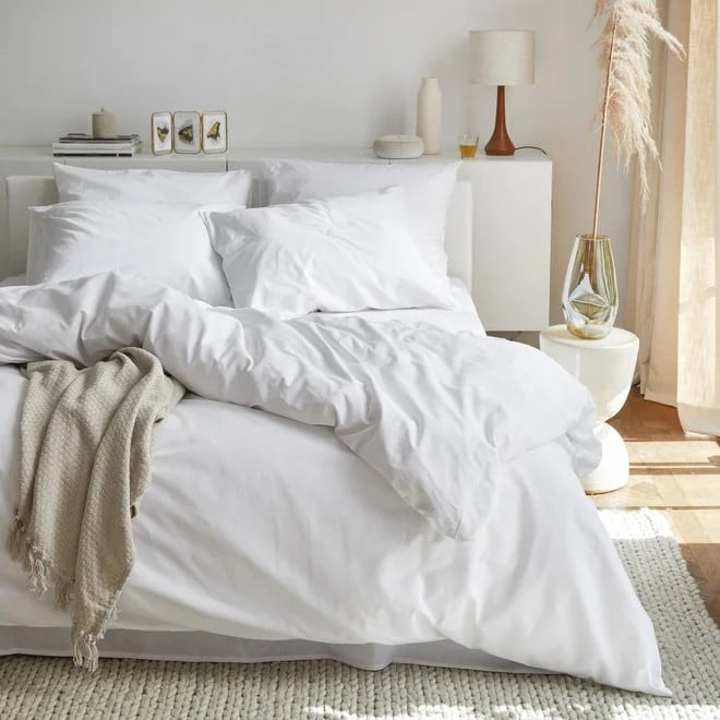 beddengoed witte slaapkamer Scandinavisch